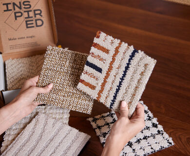 FLOR carpet tile samples in hands